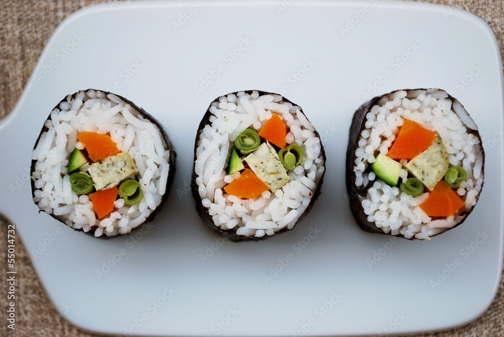 Vegetarian sushi maki rolls with tofu and nori seaweed Vegetarian sushi maki rolls with tofu and nori seaweed