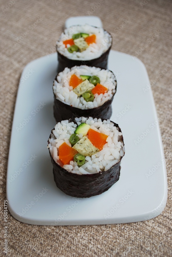 Vegetarian sushi maki rolls with tofu and nori seaweed Vegetarian sushi maki rolls with tofu and nori seaweed