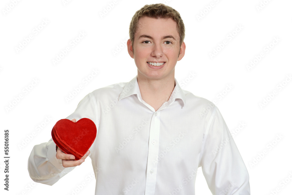 teen boy holding red heart