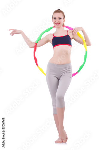 Woman doing exercises with hula hoop © Elnur
