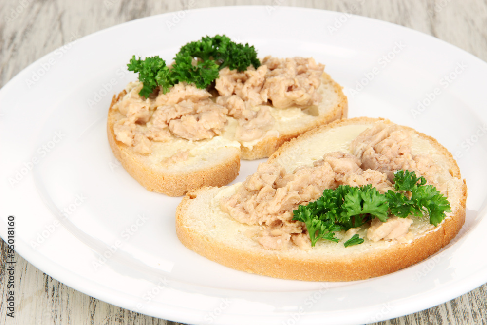 Tasty sandwiches with tuna and cod liver sardines,