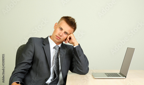 Portrait of young businessman working in office