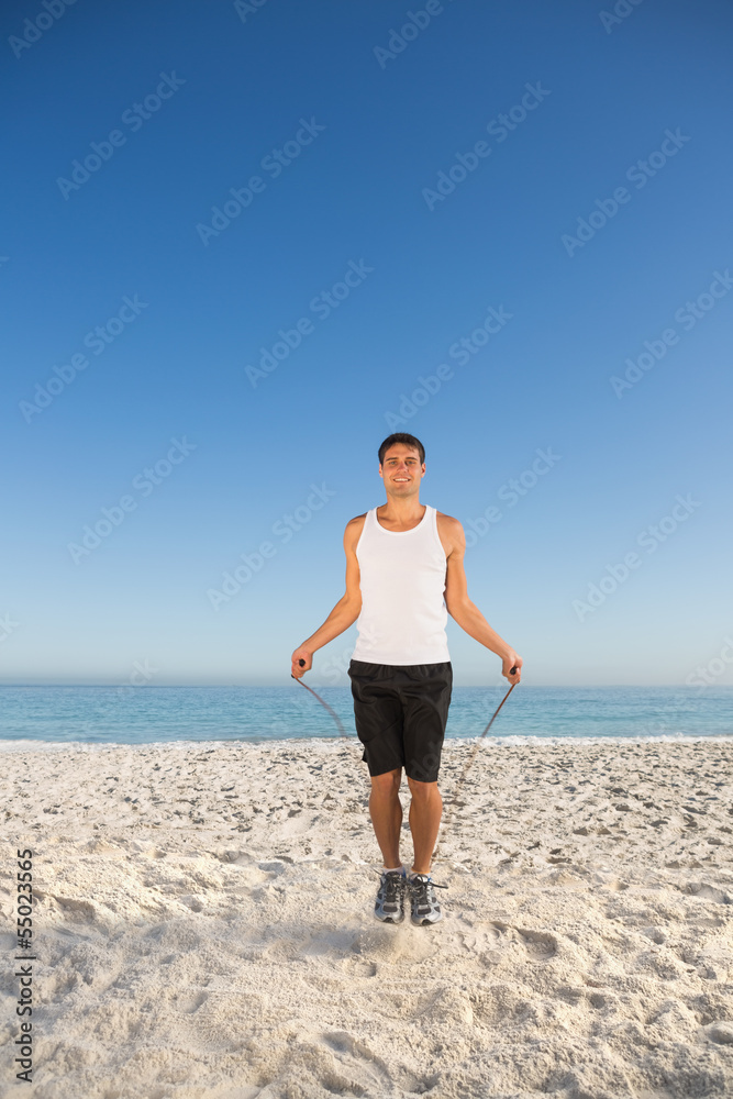 Sporty man jumping rope Sporty man jumping rope