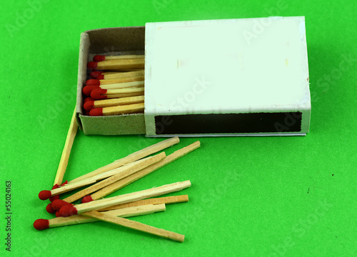 matchboxes and a few burning matches the photo
