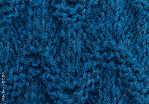 Blue knitting background texture. Knit woolen Fabric textile