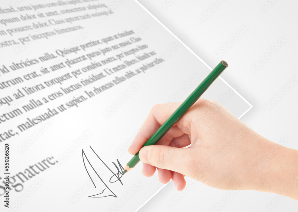 Hand writing personal signature on a paper form Hand writing personal signature on a paper form