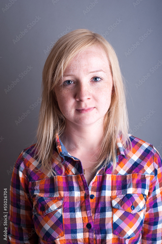 Studio portrait of freckled blonde Studio portrait of freckled blonde