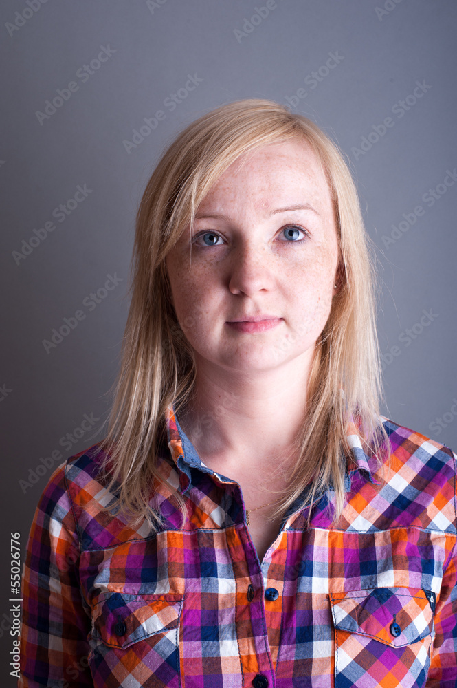 Studio portrait of freckled blonde Studio portrait of freckled blonde