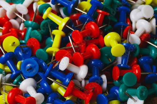 piles of plastic pins