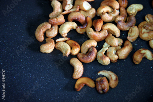 Roasted cashews in the pan.