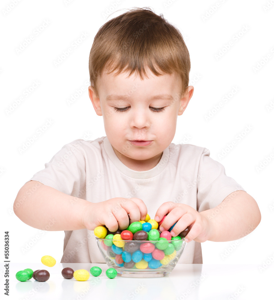 Portrait of a boy with candies Portrait of a boy with candies