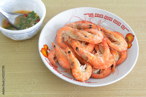 Hot steamed shrimps and seafood sauce