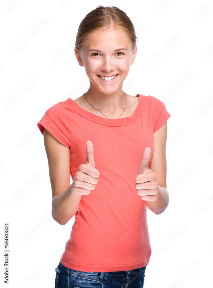 Young girl is showing thumb up gesture Young girl is showing thumb up gesture
