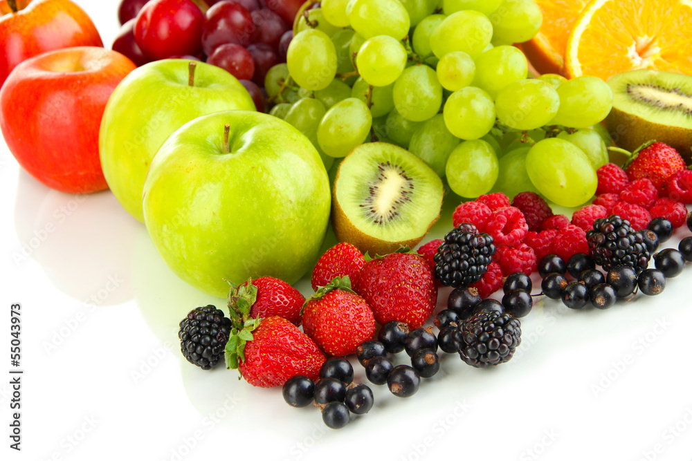 Fresh fruits and berries isolated on white Fresh fruits and berries isolated on white