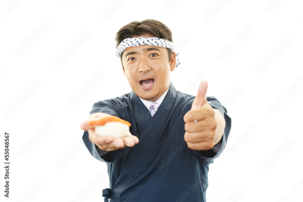 ガッツポーズの寿司職人