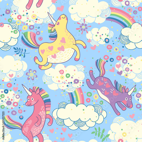 Cute seamless pattern with rainbow unicorns in the clouds