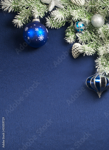 Christmas decorations over  blue  satin