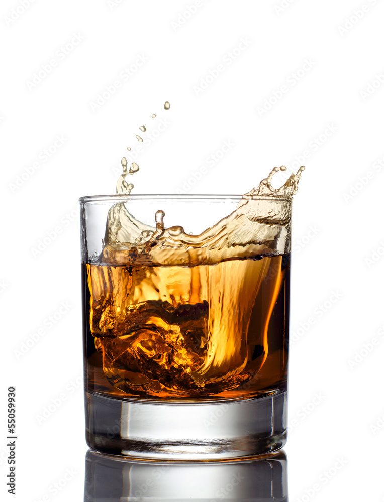 whisky splash isolated on a white background whisky splash isolated on a white background