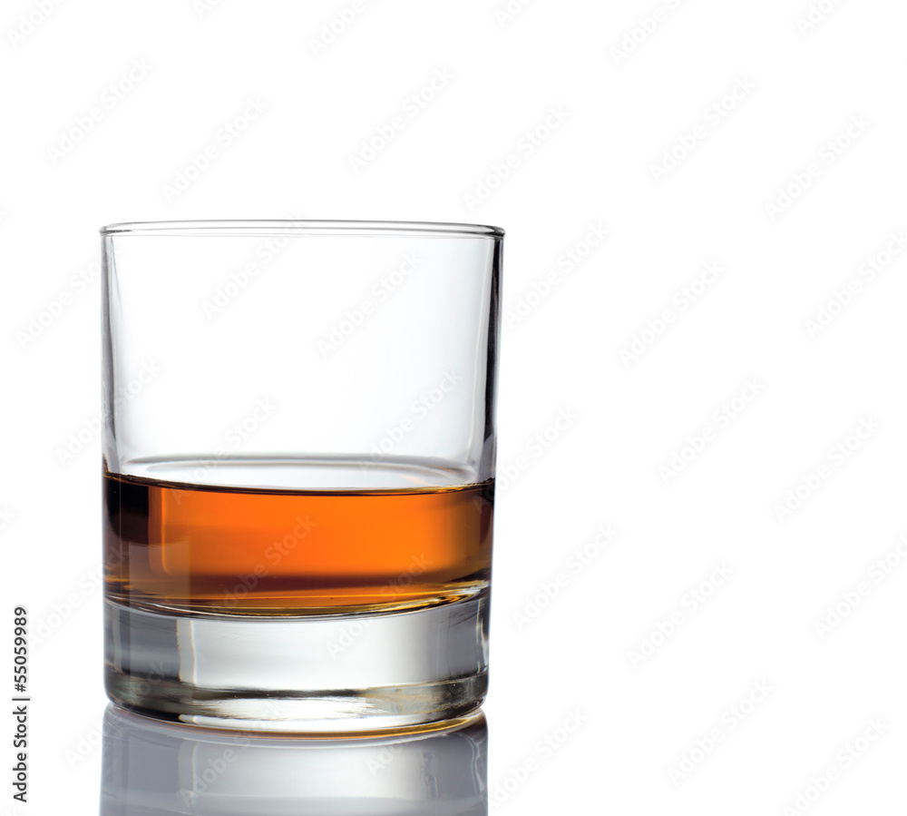 Glass of whiskey solated on white background