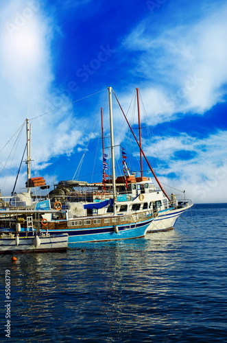Boats in a Harbour and a Blue Sky