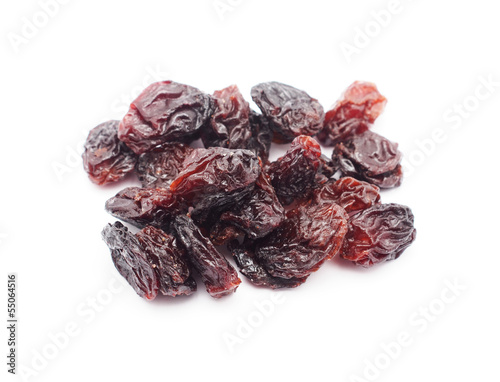Raisins on the white background