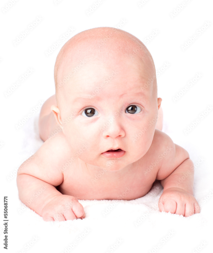 Cute baby lying on towel