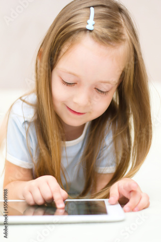 girl using tablet computer