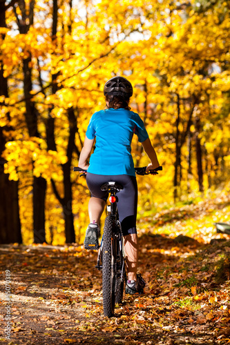 Healthy lifestyle - teenage girl biking