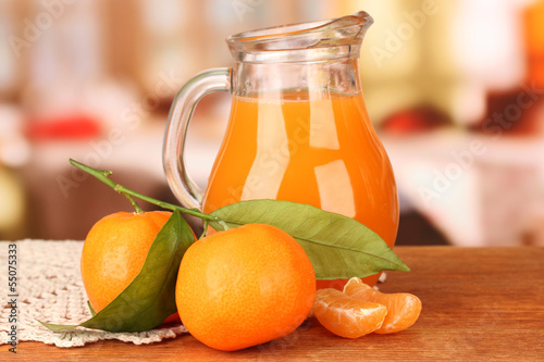 Full jug of tangerine juice,