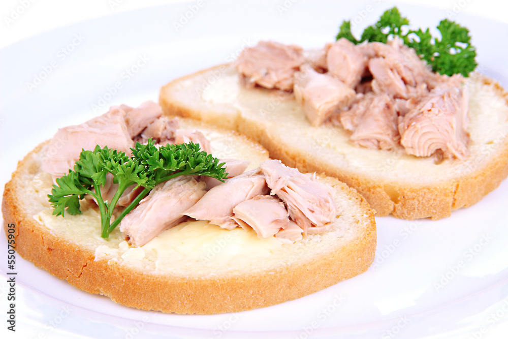 Tasty sandwiches with tuna and cod liver, isolated on white Tasty sandwiches with tuna and cod liver, isolated on white