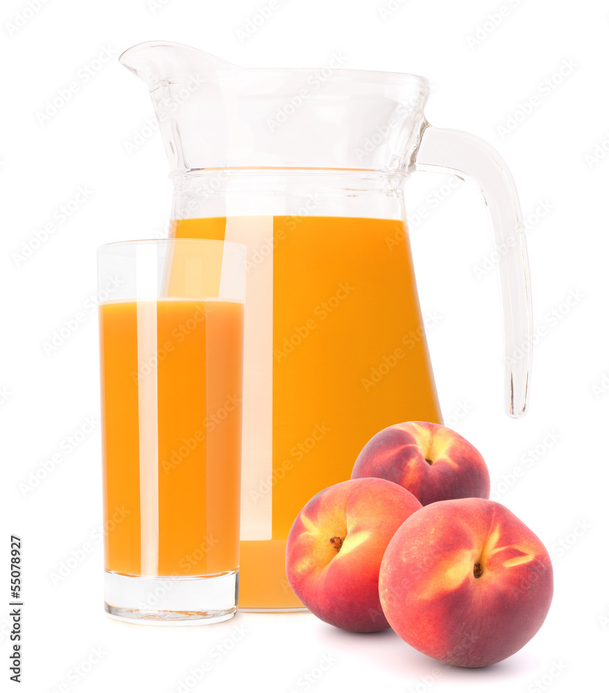 Peach fruit juice in glass jug Peach fruit juice in glass jug