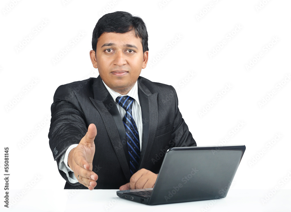 Cheerful Young Indian business man with Laptop Cheerful Young Indian business man with Laptop