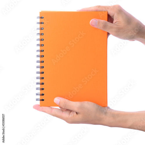 Blank notebook showing by man's hands