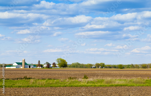 American Farmland With Blue Cloudy Sky