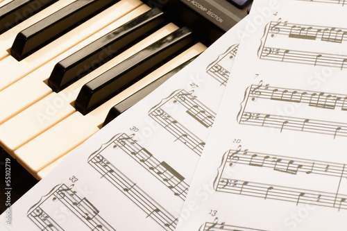 piano keyboard and sheetmusic