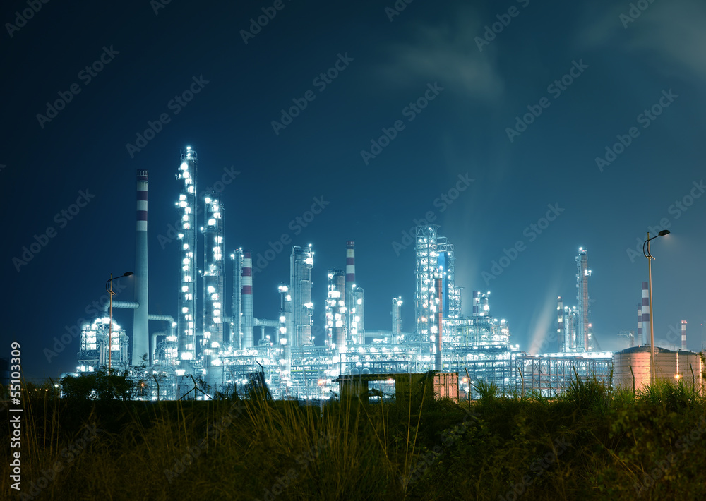 Obraz premium Refinery industrial plant with Industry boiler at night