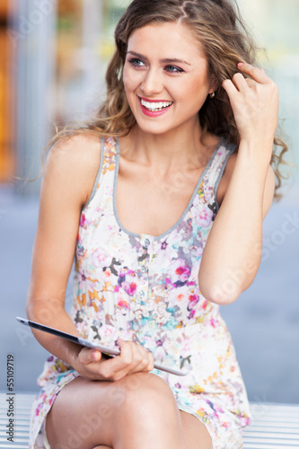 Attractive woman with digital tablet