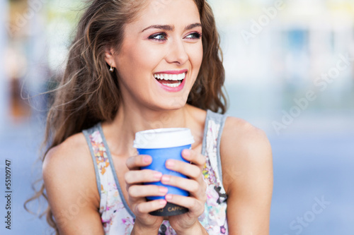 Foto Young coffee drinker