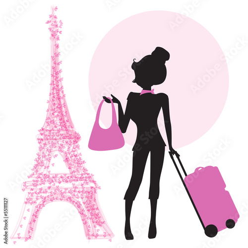 young  woman with suitcase in Paris