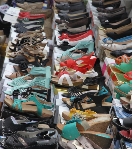 Sandals and shoes for trendy women sold at local market