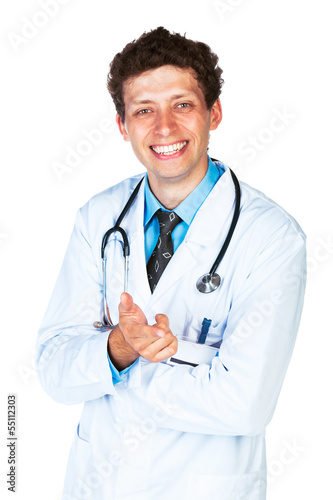 Portrait of a smiling male doctor showing finger at you on white © vladstar