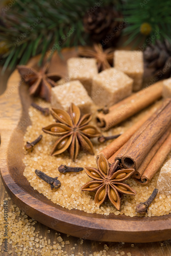 spices and brown sugar for a Christmas baking in a wooden bowl
