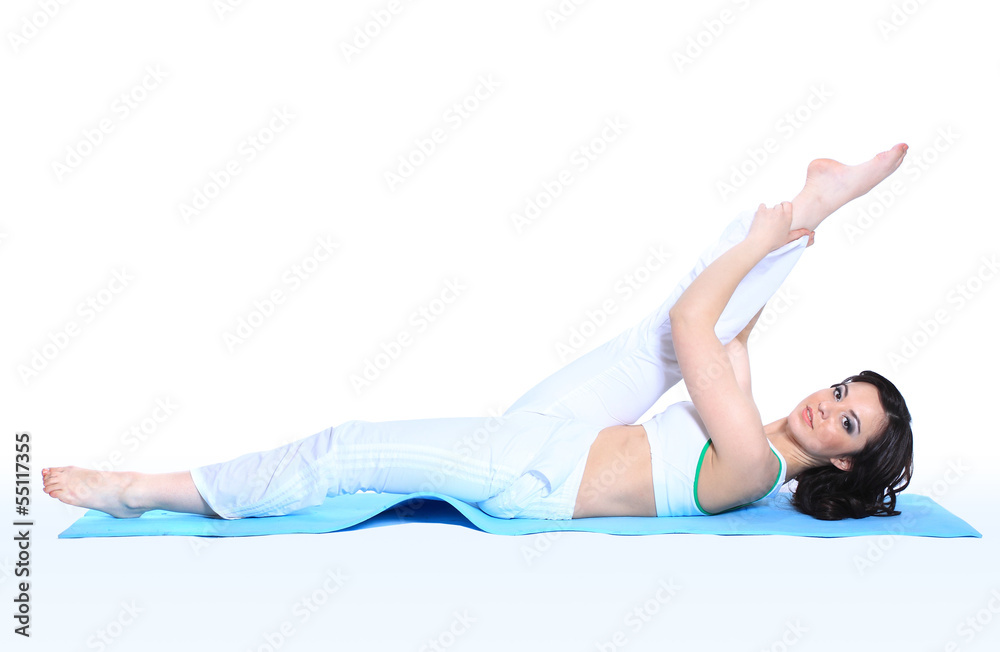 young woman in yoga pose on isolated white background young woman in yoga pose on isolated white background