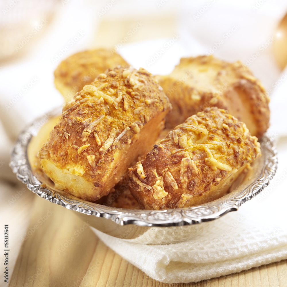 cheese rolls on a silver plate