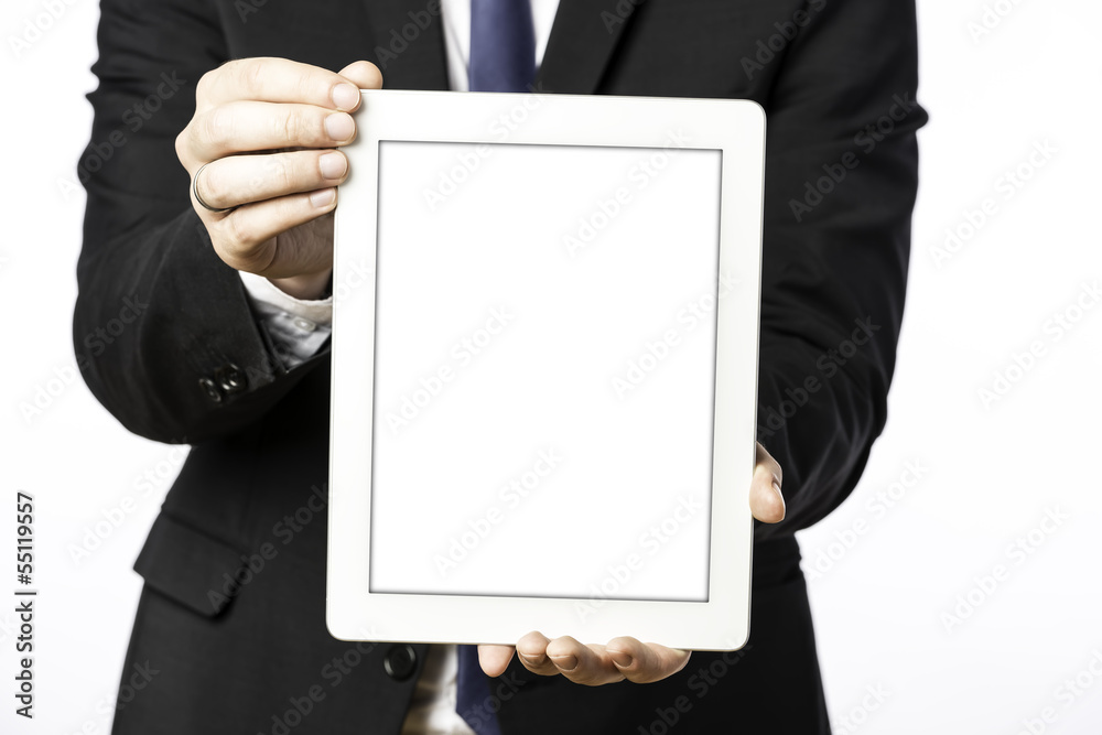 Business man shows his blank tablet computer Business man shows his blank tablet computer