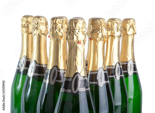 Sparkling wine bottles on a white background