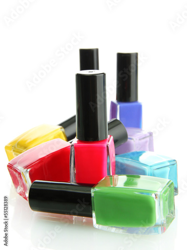 Group of bright nail polishes isolated on white