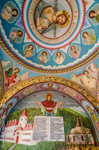 Painted wall at entrance into Sambata monastery