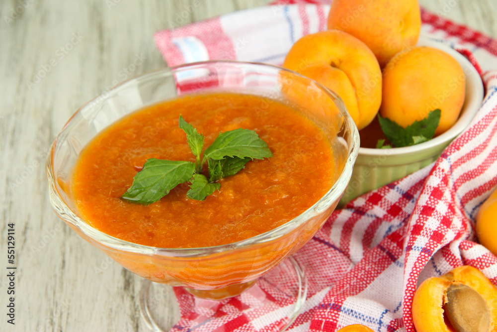 Apricot jam in glass bowl and fresh apricots, Apricot jam in glass bowl and fresh apricots,