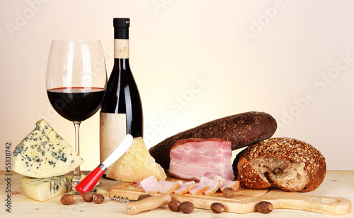 Fototapeta Naklejka Na Ścianę i Meble -  Exquisite still life of wine, cheese and meat products